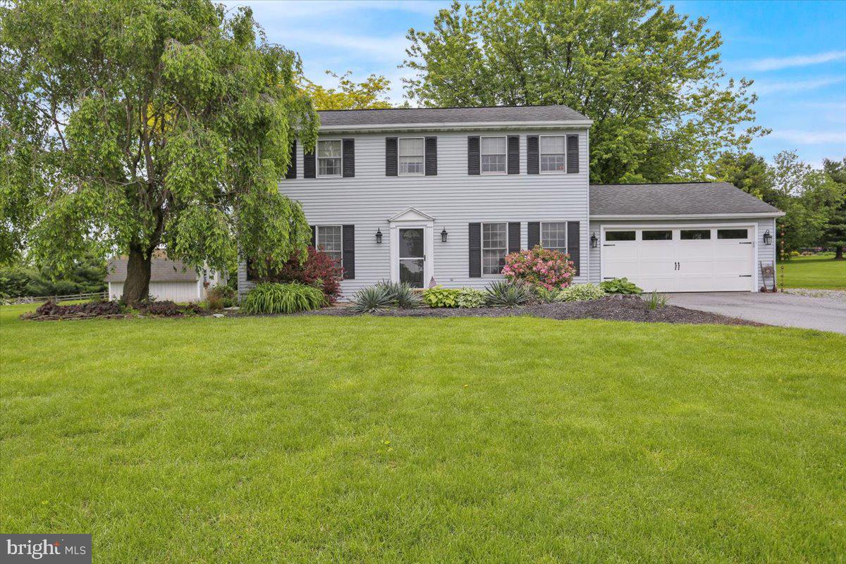 Welcome to this beautifully maintained 2-story home offering 3 bedrooms, 2.5 baths, and a warm, inviting atmosphere throughout. The main level features a formal dining room with rich hardwood floors and a spacious kitchen equipped with upgraded granite countertops, ample cabinetry, a pantry, and a cozy breakfast area. Relax in the large living room, where a pellet stove adds warmth and charm on chilly evenings. Step out onto the expansive deck overlooking a private, tree-lined backyard—perfect for entertaining or enjoying peaceful mornings surrounded by nature. Upstairs, the spacious primary suite includes a sitting area and a private bath. Two additional bedrooms, a full hall bath, and a convenient second-floor laundry complete the upper level. The finished basement offers additional living space, including the potential for a 4th bedroom, and features walk-out stairs for easy access to the backyard. Additional highlights include an attached 2-car garage and a spacious driveway. Located within a mile of Kutztown University and just blocks from grocery stores and major highways, this home offers both comfort and convenience. Don't miss your chance to make this delightful property your own!