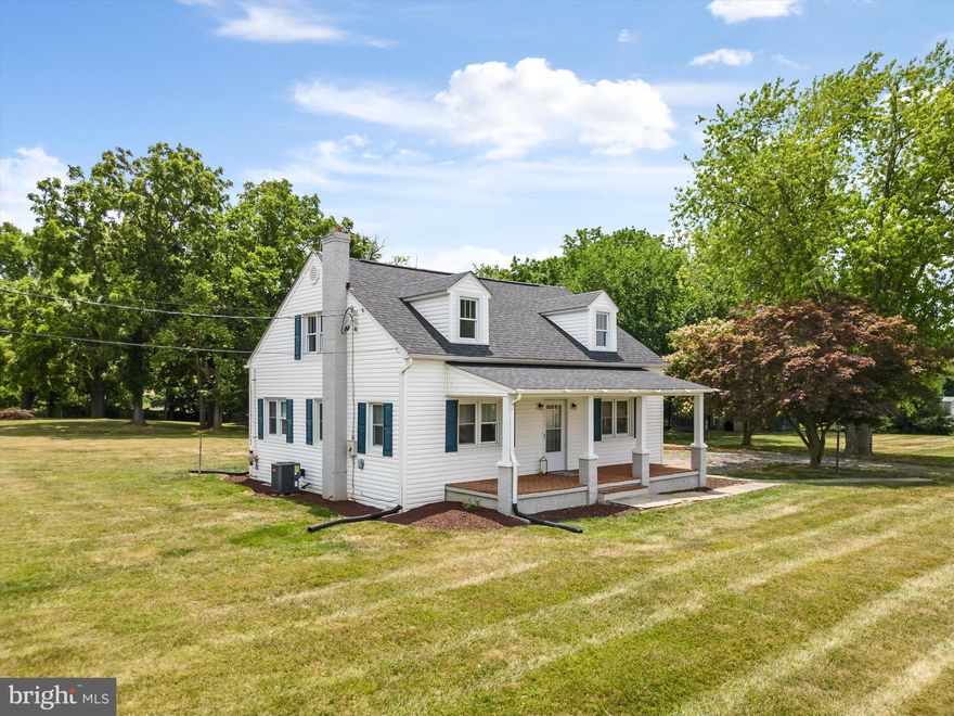This three-bedroom, one-and-a-half-bath house sits on 1.53 acres (3 lots) and is totally move-in ready!  Come home and find room to stretch out and relax away from it all.  The brick from porch invites you to sit and relax.  The screened back porch provides outdoor privacy.  And the yard...  it goes on forever.   Inside, the house has hardwood floors throughout and a newer heat pump.  The gleaming hardwood floors flow into the kitchen with stainless appliances and lots of counter space.  The main-level bedroom and an additional half bath are back through the living room.  Upstairs, are two very large bedrooms and a beautiful full hall bathroom. The cement basement is mostly unfinished, but the walls and floor are painted and at some point, a small room with flooring and drywall was added.  New windows and siding around 2017,  roof was replaced around 2019 and the HVAC is from around 2021.  This home truly is move-in ready and ready for you to make it yours!
