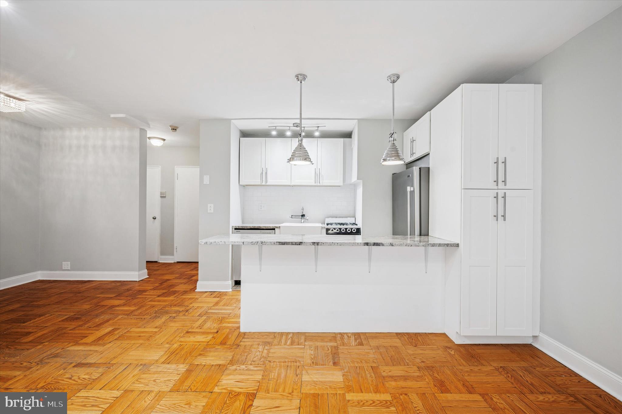 Live effortlessly in this beautifully renovated oversized studio at 2601 Parkway, right in the heart of the Art Museum neighborhood. This bright and stylish unit features high-end finishes throughout— hardwood floors, granite countertops, a full-size stainless steel fridge (with ice maker) and dishwasher, and a sleek glass shower with classic subway tile. Two large walk-in closets and a separate sleeping alcove make the space as functional as it is beautiful. Enjoy the ease of 24-hour security, a state-of-the-art fitness center, on-site laundry, a convenient store, and a restaurant—all in a pet-friendly building. Step outside to the best of the Fairmount neighborhood: Whole Foods, the Barnes, the Art Museum, Schuylkill River Trail, Kelly Drive, and all the cafés and shops along Fairmount Ave. Luxury, convenience, and location—this is easy city living at its best.