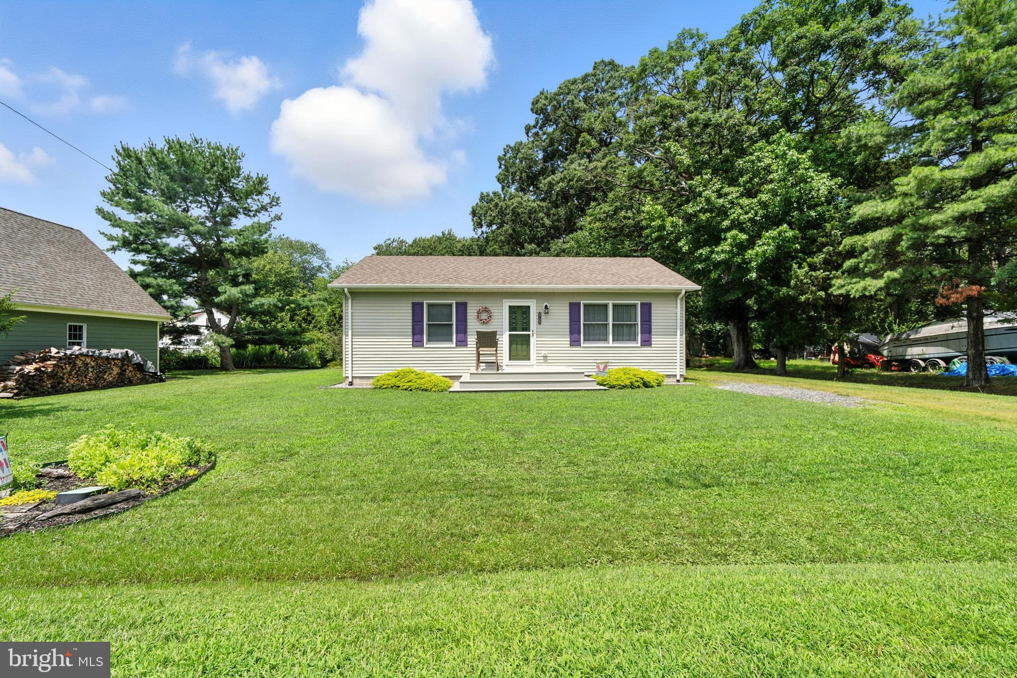Perfect Starter Home or Weekend Getaway in a Water-Oriented Community of Rock Hall !! The Pearl of the Chesapeake !!
Welcome to your charming retreat just minutes from the water and Walking Distance to Town Shops, Restaurants and Marinas!
Whether you're a first-time homebuyer or searching for the perfect second home, this cozy 2-bedroom, 1-bath offers comfort, convenience, and a relaxed coastal lifestyle—all at an affordable price.
Outdoor Features You'll Love: Landscaped lot with plenty of space for water toys, Two storage sheds and a carport/awning for your car or boat. Front patio with Trex decking —great for morning coffee or evening chats
Spacious screened-in porch with ceiling fan and concrete floor for your favorite beverage and Book !!
There is a Remote-controlled awning, ideal for shaded outdoor cookouts. Low-maintenance vinyl siding and protected crawl space entry and vapor barrier.
Inside the Home:
Eat-in kitchen with ample cabinet space and all-electric appliances.Laundry closet with washer and dryer included. Cozy carpeted living room with a large bay window and ceiling fan.Two comfortable bedrooms, each with ceiling fans and carpeted. Classic retro-style bathroom !!!
Whether you're starting your homeownership journey or seeking a peaceful weekend spot close to the water, this well-kept home offers the space, location, and lifestyle you're looking for.
Don't miss this opportunity to own in a sought-after, water-oriented community—schedule your showing today BEFORE ITS GONE !!!