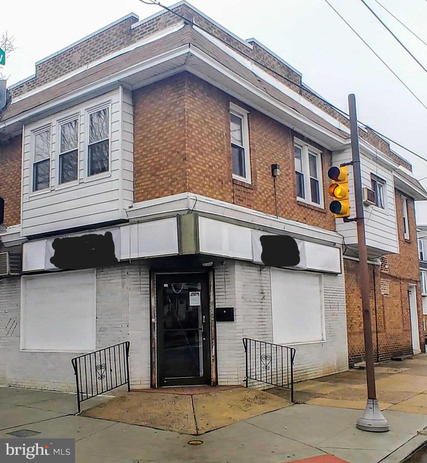 Professional Office. Currently being used as a real estate office on 1st Floor and apartment on 2nd Floor.