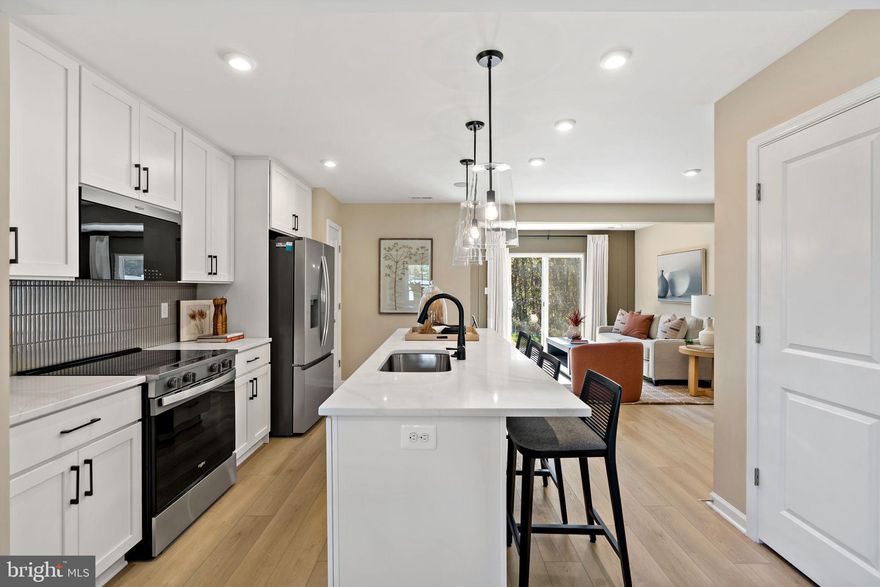 *OFFERING UP TO $10K IN CLOSING  COST ASSISTANCE FOR PRIMARY RESIDENCE WITH USE OF PREFERRED LENDER AND TITLE.*
2 Level Townhome with an extended kitchen island! Step Into comfort and style with this beautifully designed 2 level townhome featuring 3 bedrooms, 2.5 bathrooms and a spacious, thoughtfully designed layout. The main level offers an open-concept living area filled with natural light, a modern kitchen with white cabinets, quartz countertops, stainless steel appliances, and a large center island, plus a cozy dining area that opens directly to the backyard. A convenient half bath and additional storage space complete the first floor. Upstairs, you’ll find all three bedrooms, including a generous primary suite with a walk-in closet and private ensuite bathroom with two additional bedrooms that share a full bath. You will also find the laundry area conveniently located upstairs. Outside, enjoy a covered front entry and the bonus of an oversized paved driveway that fits up to 4 vehicles. *Photos may not be of actual home. Photos may be of similar home/floorplan if home is under construction or if this is a base price listing.