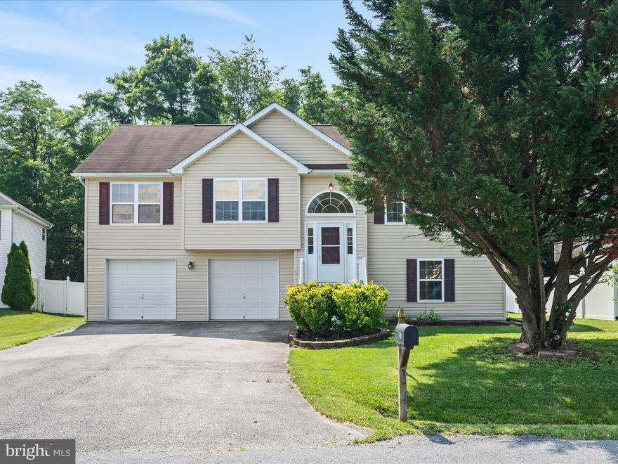 Located in Sycamore Village, this spacious home offers 1954 Sq ft of finished living area, plus an oversized two-car garage. 4 bedrooms and 3 full baths perfectly designed for comfortable living. The combination kitchen and dining area is ideal for gatherings with an open floor plan. Step out onto the deck to enjoy serene views of the backyard, which backs to trees for added privacy. Recent updates include fresh paint, new carpet, and a new indoor HVAC unit (2024), with the outdoor unit replaced in 2019. This home is situated in a prime location—close to shopping, restaurants, the RT 9 Bypass, and Interstate 81—making commuting and daily errands a breeze.  The home needs window replacement - seals need to be repaired.