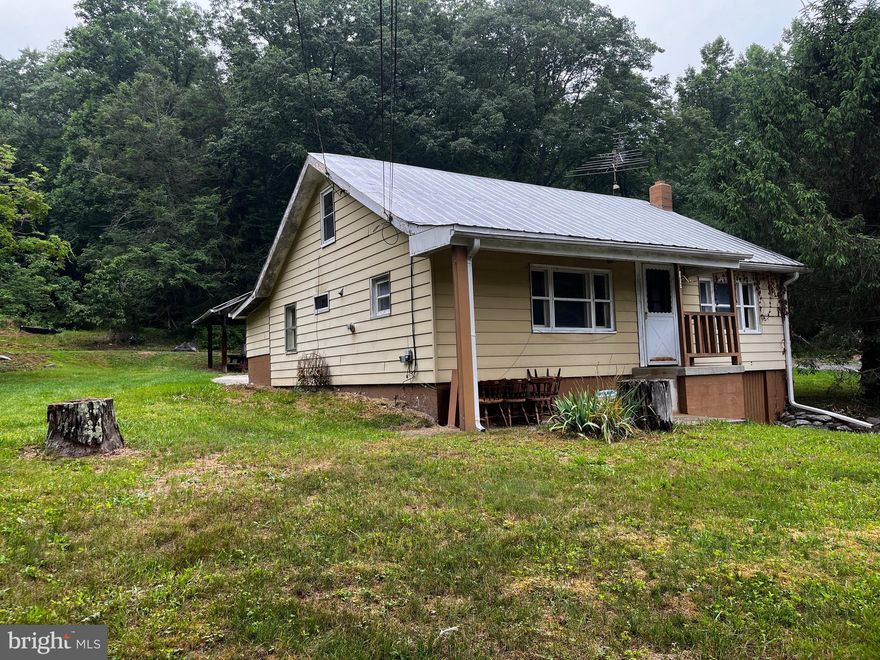 This home sits on 2.58 acres (two parcels) with a beautiful MOUNTAIN setting.  Investors, Remodelers, and Renovators come check out the POTENTIAL of this fixer upper!  Pavilion in backyard.  See it before it's gone! Close to all amenities, Frederick and Hagerstown have to offer. Minutes to Appalachian Trail, Greenbriar State Park, Catoctin Mountains and Cunningham Falls.    Buyer to verify information regarding the water source.  The buyer may need to drill their own well.  Opportunities Await!