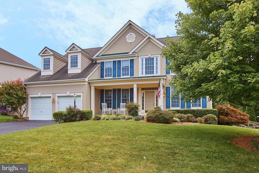 Absolutely Immaculate & Adorable Stucco Eton Model w/Front Porch*Cul-de-sac*Huge Screened Porch*Trex Deck*Fenced Yard on.31 Acre Lot*Gourmet Kitchen w/ Corian*Cherry Cabinets*Ceramic Tile Floor*Pantry*Mud Room/Laundry Room*Main Level Study*Family Room w/Stone Fireplace*Formal Living & Dining Rooms w/Detailed Moldings*Spectacular Master Suite inc Sitting Room & 2nd Fireplace*Unfinished LL w/Walkup