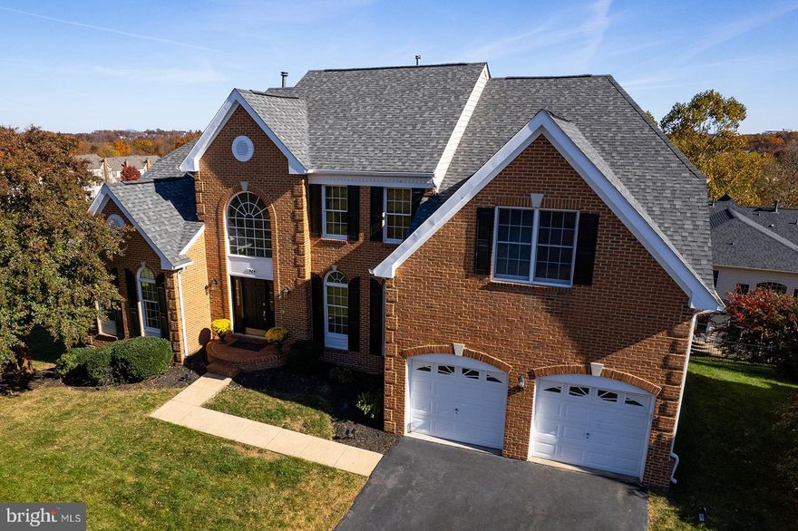 Great NEW PRICE!

One of only a few rare, Main Level Primary Owners Suite, with pristine golf course views. Perfect for multigenerational families, rightsizing, and visits from grandchildren. This gracious home sits on one of the highest peaks in the community, offering grand views from every room.  Your growing family has plenty of room with five bedrooms on the top two floors. Or, if you are right-sizing, the Main Level primary en suite gives you the privacy you need. At the same time, your family and kiddos have all they need on the upper level, including a 2nd Primary ensuite bedroom along with three additional bedrooms and another full bath with a tub. The spacious den/game room will keep everyone entertained upstairs. It's the perfect home for multigenerational families, rightsizing, growing families, and visits from grandchildren. The main level entry showcases stunning hardwood floors with a winding staircase to the upper level and a formal two story foyer leading to the Living Room and Dining Room off each wing. Continue to the two-story Family Room with a wall of floor-to-ceiling windows and a gas or wood fireplace with stone hearth. The kitchen is a chef's dream with modern design, raised granite counters, and stainless steel appliances. The extra large pantry and laundry room are off the kitchen area and garage entry. The rear staircase leads to the Den/Game Room and upper-level living quarters.
The lower level is a walk-out with rooms already laid out and ready for you to bring your
designer. A potential 6th bedroom and 4th full bath are plumbed in. A media center is designed, and the
main living area has above-ground windows for plenty of natural daylight. All it needs now is YOU!

Belmont Country Club offers an exceptional blend of luxury, convenience, and lifestyle in
Loudoun County, Virginia. This exclusive, private, and gated Golf & Country Club community
provides a serene, suburban retreat just moments from the hustle and bustle of Washington,
D.C.

Nestled between the nation’s capital and Leesburg, Belmont Country Club is designed to offer
all the amenities you desire within reach. The community boasts shopping, dining, schools, and
churches, all conveniently located throughout the Belmont and Ashburn neighborhoods. Inside
the Gates, enjoy access to the Country Club with private dining, Swimming Pool, Fitness Center,
scenic trails, and playgrounds. Belmont provides a private golf course, a world-class racquet club, a community pool, a welcoming clubhouse, and a state-of-the-art gym for golf and sports enthusiasts, making every day feel like a vacation.

With a private 18-hole golf course and racquet club, pristine swimming pool, gym facilities, and
a world-class restaurant for dining, you may never have to leave the gates. However, Ashburn
and Loudoun County offer tons of shopping, dining, entertainment, movie theatres, golf and
sporting experiences, churches, and community activities. Everything you could ever want is just
minutes away.

This luxury home isn't just a residence but an entry into a lifestyle of comfort and elegance—a
unique opportunity to embrace the dream you’ve worked so hard to achieve.

Luxury, location, lifestyle—you truly can have it all at Belmont Country Club.