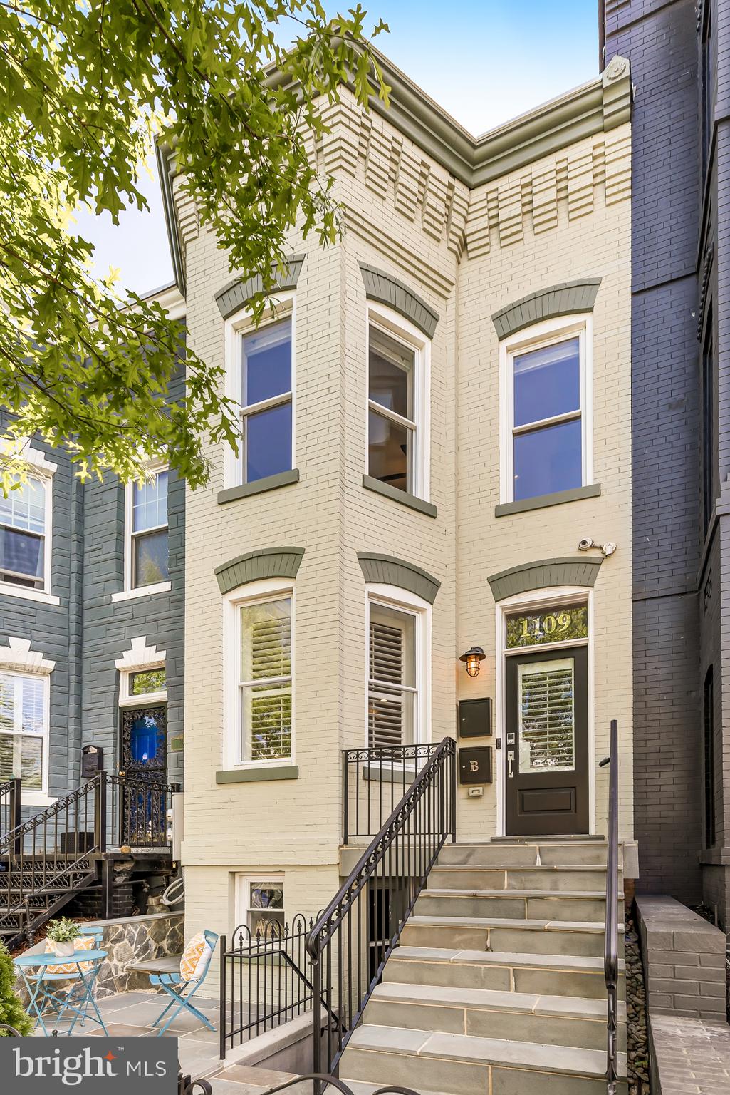 Located on a quiet one-way street, 1109 I St NE is an oasis just steps from the endless amenities of vibrant H St NE. This fully renovated 5-bedroom, 3 and ½ bath home stuns with its soaring ceilings and high-end finishes. Boasting nearly 2,400 sq ft, it features an open floor plan on the main level with exposed brick, newly refinished red oak hardwood floors, built-in speakers, and custom kitchen cabinets with copious storage. The skylit upper level includes 3 bedrooms with Elfa closet systems and 2 full baths glimmering with floor-to-ceiling Avalon Marble tile. The lower level features a 2-bedroom 1-bath unit with a Certificate of Occupancy that's currently leased for $2,200/mo. The opposite of a dark English basement, this money-maker has high ceilings, a modern kitchen and bath, spacious custom closets, and windows in every room. Relax and entertain in two distinct outdoor spaces with a flagstone patio in the front and pavers throughout the back. A large shed, secure parking for two cars, and dedicated EV charging complete the package.