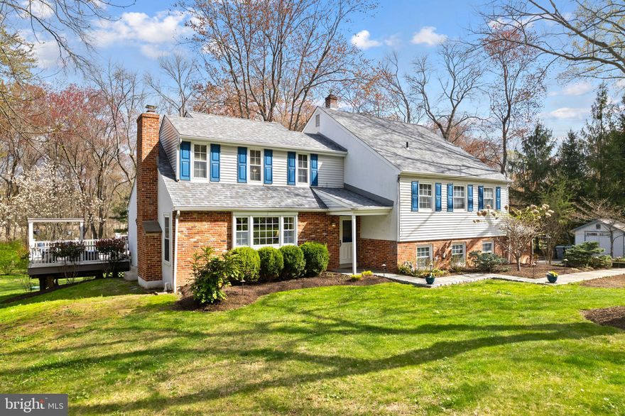 Welcome to this classic American dream home, with warm red brick, clean white siding, and charming blue shutters that frame the windows beautifully. The front porch is perfect for enjoying your morning coffee, surrounded by greenery. Plus, there's a spacious two-car garage!

This inviting split-level home offers a smart and functional layout that enhances both comfort and flow. Step inside to a bright and welcoming main level with a cozy living room, a formal dining area, and a well-designed kitchen—complete with a sink by the window…

The dining room conveniently exits to a large new deck, which overlooks a beautifully landscaped backyard, offering a peaceful space for outdoor relaxation and enjoyment.

Just off the kitchen, you’ll find a spacious family room featuring built-in shelves, window seats, and plenty of natural light. It’s the perfect spot to relax, work, or gather with loved ones. The family room also includes a newly updated half bath for added convenience and leads directly out to the flagstone patio, ideal for outdoor dining, entertaining, or simply enjoying the tranquil surroundings.

Upstairs, you’ll find three roomy guest bedrooms, each with ample closet space. The primary suite is a true retreat, with a newly remodeled private bath—featuring modern finishes and a fresh, stylish look that adds a touch of luxury to your daily routine.

One of the most exciting features is the unfinished attic. It’s a blank canvas with so much potential—create a spacious master suite, a creative studio, or an additional living area. With the right vision, it could add significant value and square footage to the home.

Lovingly maintained over the years, this home gives you peace of mind and a strong foundation for personal updates or future plans.

Located in a peaceful and popular neighborhood, this 4-bedroom, 2.5-bath home blends comfort, charm, and opportunity. Just steps from Fort Washington State Park and minutes from the Philadelphia Cricket Club, you’ll enjoy the best of nature, recreation, and convenience.

Don’t miss your chance to make this warm, versatile, and well-maintained house, your forever home!