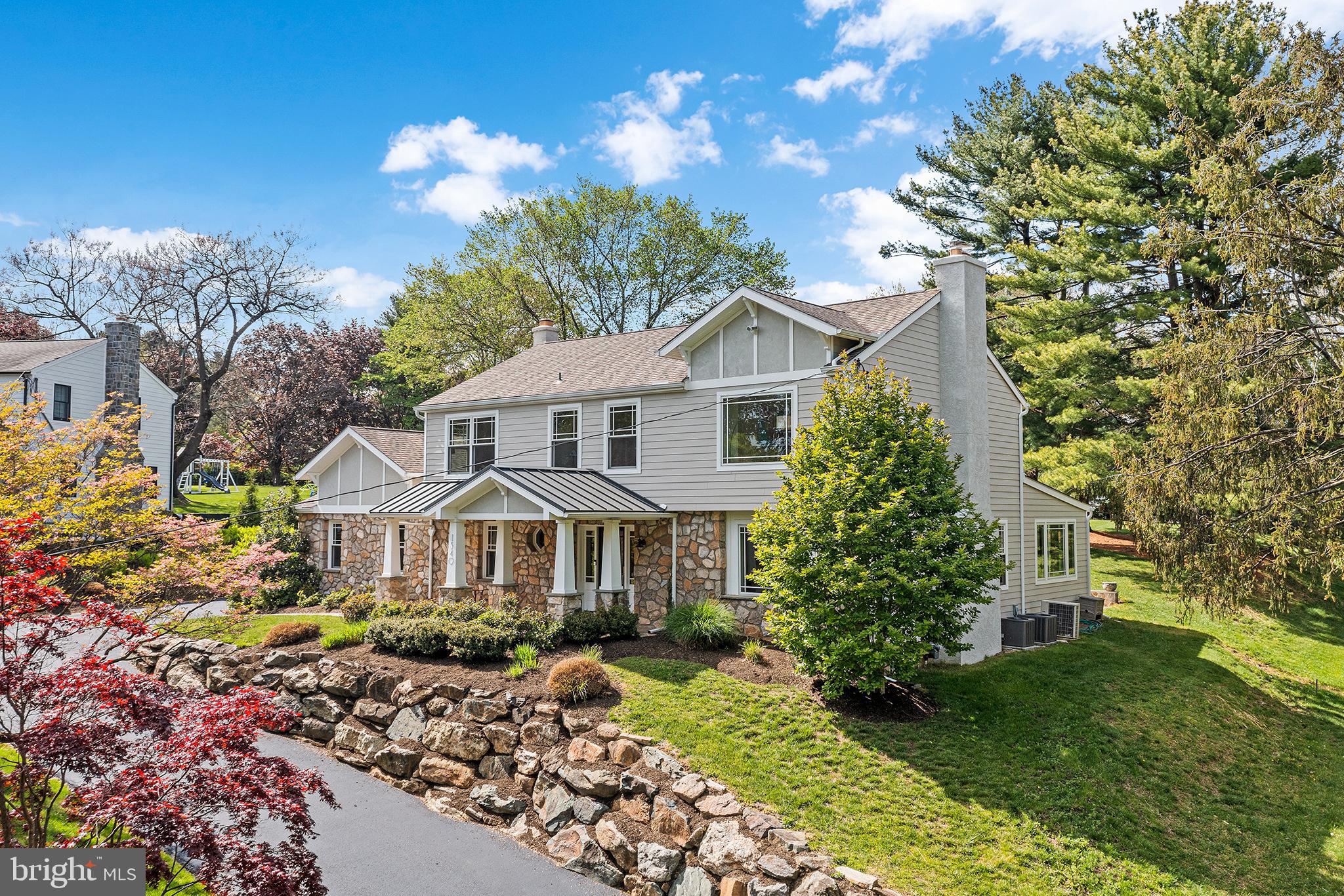 Stunningly renovated and meticulously maintained, 1540 Briar Hill is a home that any buyer would be proud to call their own. Completely renovated in 2017, you won't have to worry about projects, upcoming renovations, or replacing major systems- move right in and enjoy the views and luxurious interior. The gourmet kitchen features a large island with seating, quartz counters with a mitered edge, custom Poggenpohl cabinetry, Wolf wall and convection ovens, a Thermador gas cooktop, and a panel front Fisher & Paykel refrigerator. Views from the large window over the kitchen sink out onto the large rear yard are a nice bonus. First floor laundry and mudroom are conveniently located off the garage and lead you into the first living space with a wood burning fireplace (currently being used as an office). An oversized dining room has ample space to seat 10-12. The family room has access to the rear deck and patio, features large windows on 3 sides, and a gas fireplace that adds to the ambiance. A powder room completes this floor. Upstairs, you'll find a light filled primary suite with a walk in closet, 2 reach in closets, and a stunning marble bathroom with soaking tub and separate shower. Two additional bedrooms share an ample hall bathroom with linen closet. The fourth en suite bedroom is a perfect space for guests, which has it's own private bath. Additional walk in attic storage is accessible through the en suite bathroom. The lower level is a multipurpose space that is currently utilized as a music studio, bar/lounge, and additional tv space. This home is a unique blend of both privacy and a neighborhood that is close to so much in both Lower Merion and Center City.