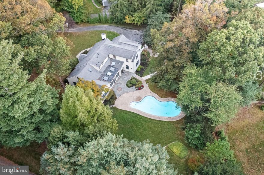 Come and enjoy this stunning completely renovated Cape Cod style home in the heart of Radnor Township.  This spacious 3900sq ft plus home has so much to offer after undergoing a complete renovation.  This beautiful home is nestled on almost an acre level lot in the Woodcrest neighborhood with a pool, separate hangout/pool house with exposed wood beams, ample sitting areas both around the pool and on the large paver/flagstone back patio.  As you enter the home you will find a gracious living room with hardwood floors and a stone façade fireplace.   This chef inspired kitchen is every cooks dream complete with Café Professional series appliances and a Fisher & Paykel refrigerator.   The honed marble backsplash highlights the beautiful white cabinetry and quartz countertop, and the butler bar has ample counter space, a beverage refrigerator, and a bar sink.  The light filled main family room has access to the year-round sunroom that overlooks the beautiful backyard and pool.  The side entrance gives you access to a mudroom, garage, and a beautiful laundry room with ample storage.  The first-floor primary bedroom has a beautiful sitting room that overlooks the backyard and has access to the year-round sunroom.  The primary bathroom is beautiful with a free-standing tub, double vanity, and a large shower.  This primary suite is complete with his and hers walk in closets.  On the main level you will find 2 additional bedrooms and or an office and a full bathroom with access to the outside pool area.  The second level has a 2nd large primary suite with an ensuite bathroom with a floating double vanity and large shower.  The custom walk-in closet has ample space for both his and hers.  Two more bedrooms and a hall bathroom complete the 2nd floor.  The lower level has an additional 600 plus sq ft of finished space.  With its luxury plank vinyl floors and a reeded wall complete with TV/Cable hook up it’s the perfect space to hangout. A whole house backup generator was installed in 2020. This 5/6 bedroom, 4 bath home is in the award-winning Radnor School district. and is close to Villanova, the train, major highways, and a quick drive to downtown Wayne with local shops and restaurants.