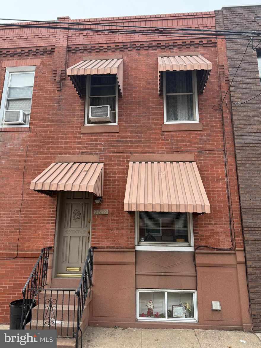 Nestled in the vibrant heart of South Philadelphia, this charming 3 -bedroom brick front townhouse is now available in the heart of South Philadelphia offering a unique blend of history, culture and modern comforts.  This classic home features a well -  maintained  living room, dining room ,  eat in kitchen and full basement with original details, and modern amenities. Situated just steps away from iconic stadiums, you'll be immersed in the excitement of sporting events and the live atmosphere of the neighborhood. You can also enjoy the convenience of the nearby Passyunk Square  with its vibrant shops, restaurants, and public transportation.  Don't miss this  opportunity  to own a  piece of Philly history!  Please note this property is being sold as-is.