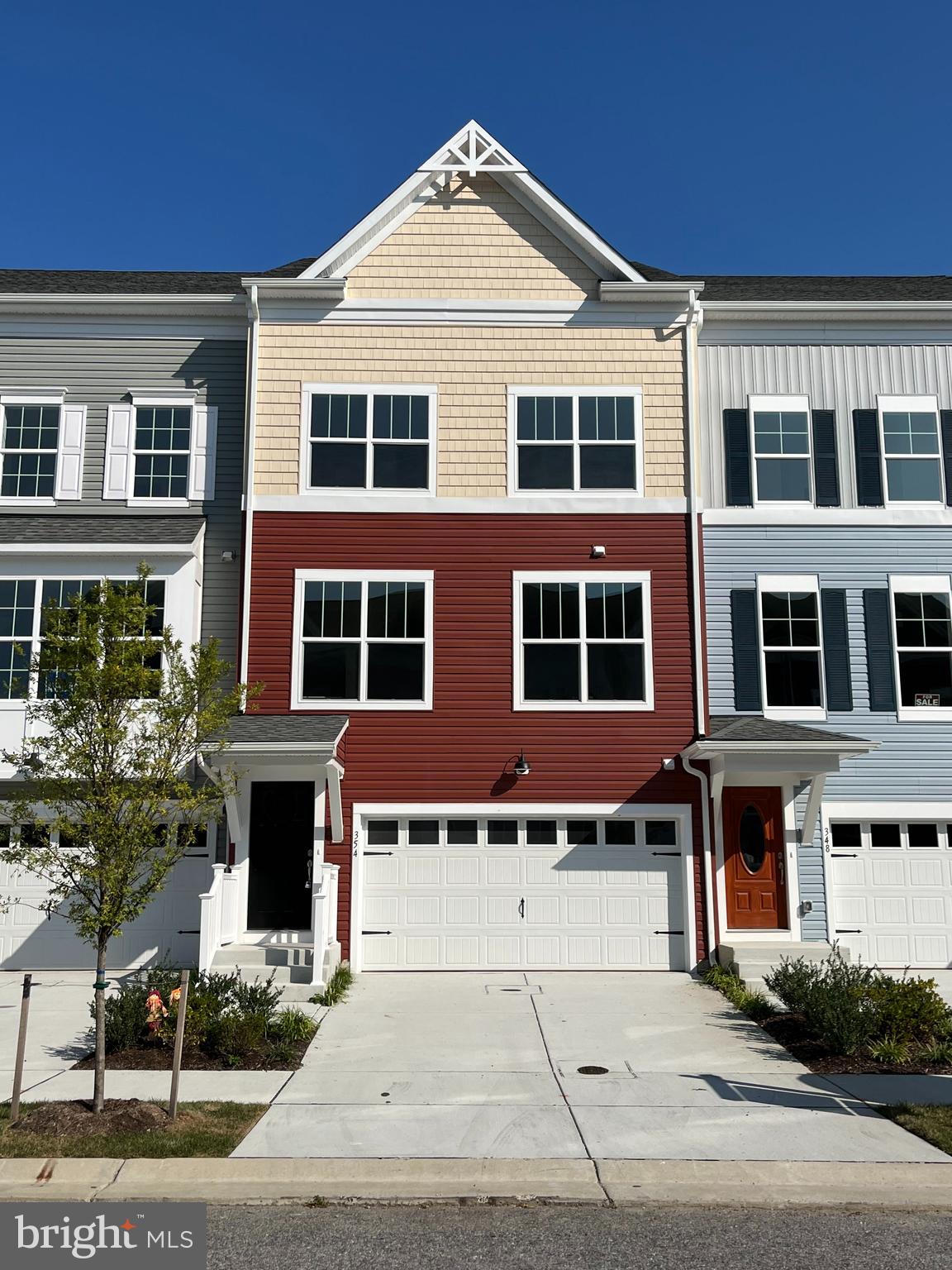 THIS IS SOLD BUT WE HAVE MORE! ****LAST PHASE Near Completion!!**** 4BR, 4BA, interior unit townhome! Upgraded Craftsman elevation. Upgrades include: Quartz countertops, stainless steel appliances with french door refrigerator, luxury vinyl flooring throughout the main living areas and stairs. Linear electric fireplace with shiplap accent wall. Large deck with trex decking material at kitchen level. Concrete patio at 1st level. Rooftop deck at 4th level. ****Please note the front exterior picture is of the actual home, all interior pictures are the model, and are not the home built**** THIS IS SOLD BUT WE HAVE MORE !! CALL US!!!