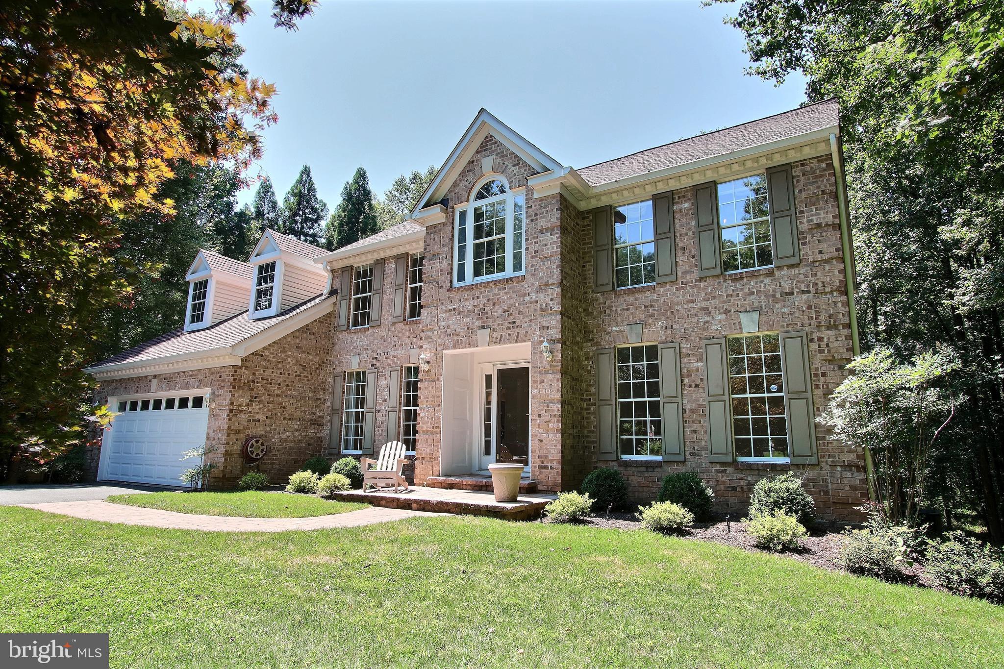 This beautiful Laytonsville home is move-in ready with more than $40,000 in recent upgrades including new flooring, paint, skylights, ceiling fans, roof, landscaping, and appliances. Backing up to Rock Creek, this spacious 1.6 acre property has an amazing sun room looking out upon a grove of tulip poplars. There are 4 bedrooms, 2 full and 2 half baths, a gorgeous multi-level deck with large hot tub and a multi-purpose basement. Other notable features include vaulted ceilings with skylights, large closets and a luxurious garden bath in the master suite. No HOA! The neighborhood is quiet, yet has convenient access to shopping, Shady Grove Metro and is just 45 minutes from all three regional airports.