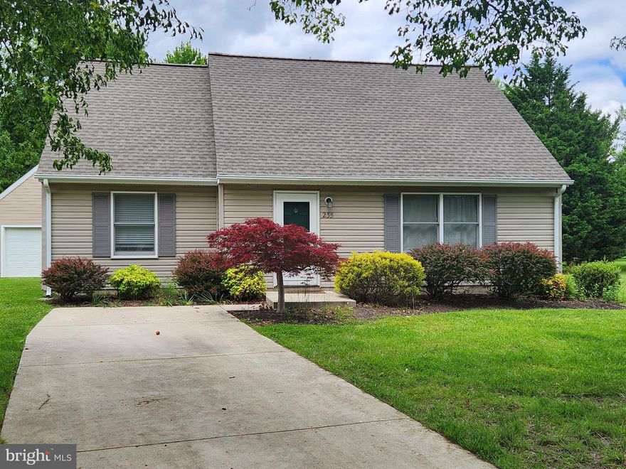 Cozy cape cod on quiet cul-de-sac lot with private driveway, outbuilding at rear is an oversized garage for boat or RV storage, or whatever you may have. Large yard, with deck off kitchen.  First floor has Luxury vinyl plank flooring, second floor has carpet. 2 bedrooms upstairs, 2 bedrooms downstairs. Washer & Dryer on first floor in kitchen closet.