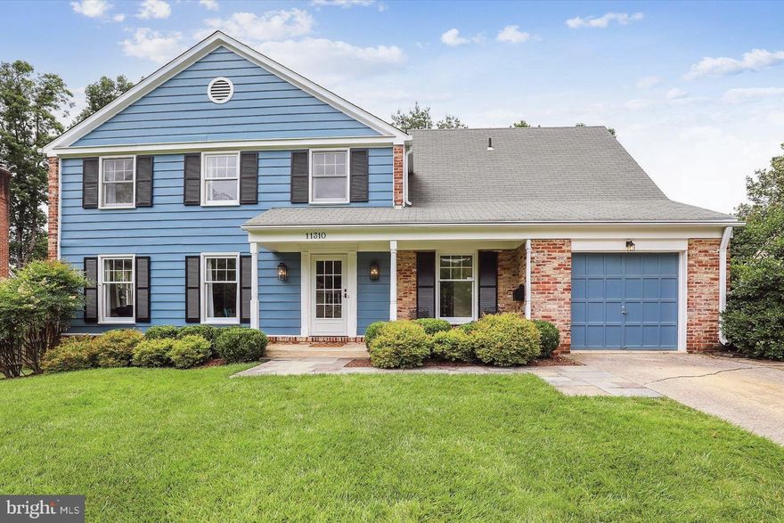 Welcome to 11310 Rolling House Road, a beautifully renovated colonial tucked away on a quiet cul-de-sac in the highly desirable Old Farm neighborhood of North Bethesda, Maryland. This four-bedroom, three-and-a-half bathroom home offers spacious living across three finished levels, blending classic charm with thoughtful modern updates. From its inviting blue-and-brick exterior, to its fabulous screened porch overlooking the backyard, this home is designed for both everyday comfort and easy entertaining. 

Step inside to find gleaming hardwood floors that flow seamlessly across the main and upper levels. The welcoming foyer leads you to a formal living room that offers bright and sunny views through the oversized windows. The dining room highlights paneled walls with chair-rail molding, creating an elegant setting to gather. The gourmet kitchen is a true showpiece—fully renovated with sleek white cabinetry, a spacious center island, quartz countertops, subway tile backsplash, and abundant storage. The inviting family room offers a natural gathering space, complete with a brick-surround wood-burning fireplace. This room extends effortlessly to a private screened porch, perfect for enjoying a blend of indoor comfort and outdoor living. A hall closet and powder room round out this main level. 

The upper level offers four spacious bedrooms and two full bathrooms. The primary suite serves as a private retreat, featuring dual closets, an updated en-suite bath with soaking tub, walk-in shower,and a bonus sitting area that can perfectly double as an at-home office. Three additional bedrooms, each with a generous footprint, share a hall bath appointed with dual vanities and a shower/tub combination.

The finished lower level extends the home’s living space with a spacious recreation room accented by custom built-in cabinetry. This versatile area is well suited for a playroom, home gym, or media lounge. A renovated full bathroom with a designer-tiled walk-in shower adds style and convenience, while a dedicated laundry room with an efficiency washer and dryer, along with a generous storage area, complete this level. Outdoor living is equally inviting, with mature trees, and landscaped ground for a private and manicured setting. Do not miss the attached one-car garage. 

Old Farm is among North Bethesda’s most sought-after communities, known for its tree-lined streets, neighborhood parks, and close proximity to the Old Farm Swim and Tennis Club, and Tilden Woods Pool. Perfectly situated near I-270, I-495, Pike & Rose, and the endless shopping and dining along Rockville Pike, the location offers unmatched convenience. With its spacious layout, excellent condition, and prime setting, 11310 Rolling House Road presents a rare opportunity for the home you have been looking for.