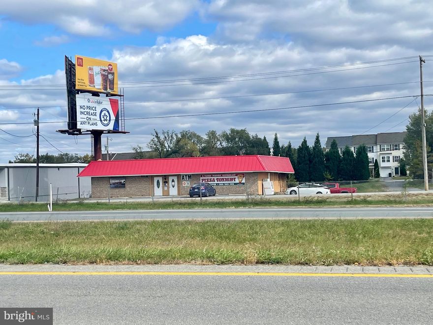 6000+ sqft building on a large lot with high visibility.  Renovated 2017 with new roof, plumbing, wiring, flooring.  Presently used as food service but could be used for a multitude of business ventures.  Prospective three units with lots of room to expand.  Income-producing billboard conveys.  Building lease presently in place on a month-to-month basis.