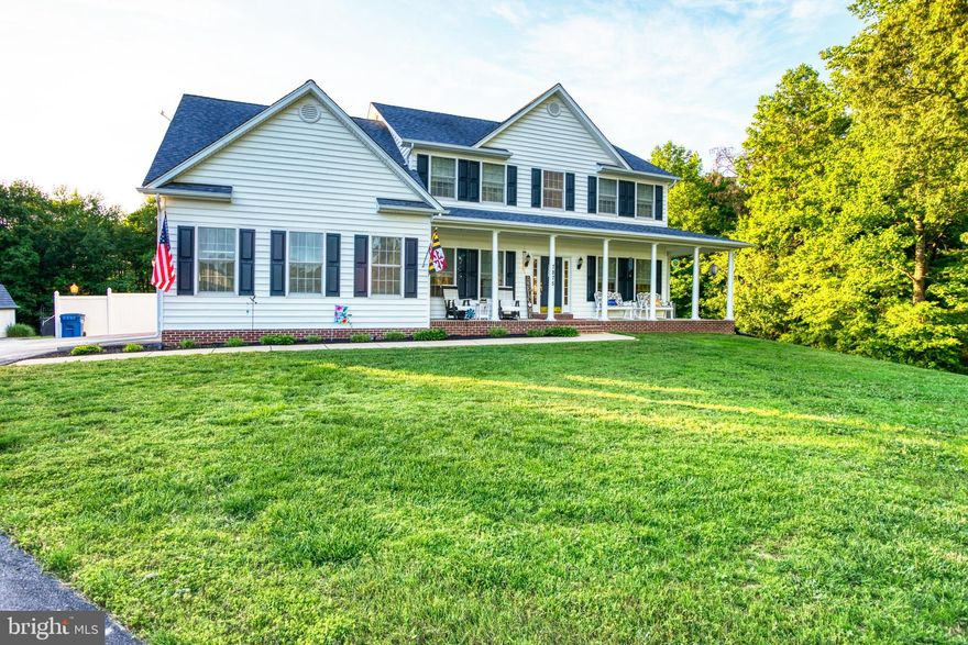 Be prepared to fall in love with this custom-built, 4BR, 2.5B, home on 4.6 private acres, located on a no-thru paved road.  This elegant home, with its country flair, is immaculately maintained with attention to detail both inside and out!  Upon entering the home you are welcomed by an inviting two-story foyer complete with chandelier.  Off of the foyer is a home office, den or whatever best suits your needs for this room.  The kitchen features Hickory cabinets and an oversized center island with a breakfast bar and an electric downdraft cooktop.  Additionally, the kitchen offers Wi-Fi enabled electric wall ovens with many features including a built in air fryer and convection cooking/baking options.  Located below the ovens is a separate warming drawer.  The kitchen also has an instant hot water dispenser, dishwasher, and a refrigerator with an in door water and ice dispenser.  The kitchen also has table space for a breakfast area.  The family room has a gas fireplace to enjoy on those chilly nights.  Off of the kitchen is a separate dining room.  The large kitchen, breakfast area and family room overlook the rear yard, the maintenance free deck and fenced in-ground swimming pool.  The French doors with retractable screens in the breakfast area lead out back making this open floor plan along with the outdoor areas a fantastic location to entertain.  Additionally on the main level is a mud room leading to the two car garage, laundry room which includes a front-loading washer and dryer with a large countertop perfect for folding laundry and also a half bath.  The upper level of the home boasts four bedrooms, three of which have walk in closets along with a hall bath.  The Primary bedroom suite offers a large sitting area, spacious walk-in closet, and a full bath complete with an oversized soaking tub, separate shower, and a double sink vanity.  If that wasn’t enough, the home also has an unfinished walk-up basement with a rough-in for an additional full bath just waiting for you to finish off this level as you want it.  Additional features of this home are an 80 gallon electric hot water heater, a whole house water filter and water softening system, two zone heat pumps with gas back-up on the main zone, a very large buried propane tank and internet through the T-Mobile Home service.  Out front there is a large wrap around front porch perfect for relaxing and enjoying a peaceful evening with a glass of lemonade and watching the deer wander through the yard.  There is also a 12’ x 24’ storage shed for your equipment and toys.  The two car side load garage even features dual Wi-Fi enabled garage door openers.  This small community of five homes is not restricted by an HOA.  This home will not disappoint you nestled in its quiet country setting, yet only 20 minutes out of La Plata.