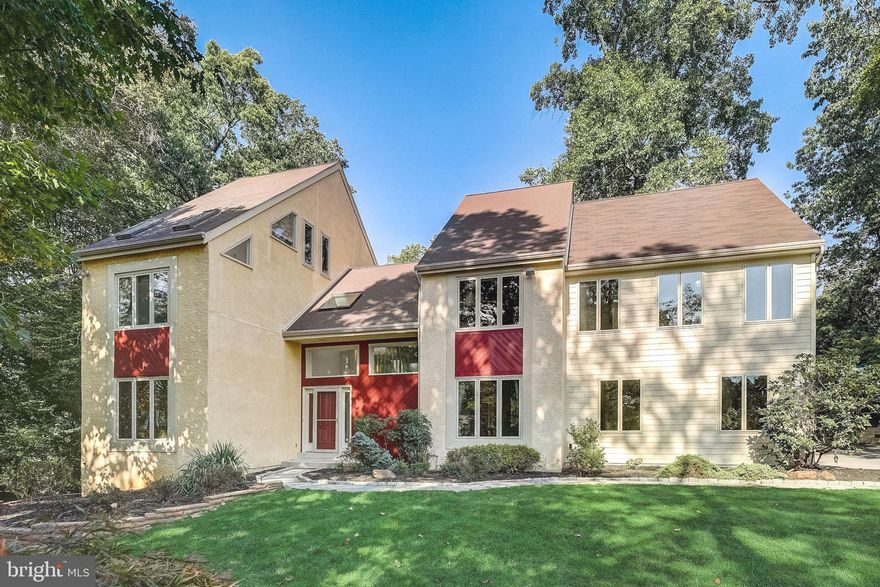 Welcome to this beautiful Indian Creek contemporary colonial that has been lovingly updated and maintained.  This home has 5 bedrooms, 4.5 baths, 3 car garage, fully finished walk-out basement and is located on a cul-de-sac. There are updated Brazilian Rosewood hard floors through much of the first floor and abundant recessed lighting throughout.  Enter through the open and airy foyer with vaulted ceiling.  To the left is the first floor bedroom (Bedroom 5) which is currently used as an office and an updated powder room with plumbing in the closet to add a shower.  Next is the family room with abundant recessed lighting and the living room with a floor to ceiling stone gas fireplace, vaulted ceiling and skylights.  The kitchen offers abundant cabinets, granite countertops, stainless steel appliances, new gas stove, elegant Italian high performance 1300 CFM hood vent ducted to exterior, breakfast area with a vaulted ceiling, skylights and access to the composite deck with built in seating, gas line, and stairs to grade.  There is also a laundry room with utility sink, cabinets and access to the 3 car garage plus a formal dining room to complete the first floor.   Head up the stairs to the 2nd floor landing with a great view of both the living room and foyer.  The large primary bedroom has a vaulted ceiling plus a finished loft/office.  The primary bathroom is well appointed with abundant cabinets & counter space, double sink, two walk in closets, large tiled shower with double shower heads and built-in seat, plus a bidet and regular toilet.   Bedroom 2 is at the other end of the hall and is a recent addition (2018) that also added a walk in closet and ensuite bathroom with large vanity, double sink, jetted tub, tiled shower with double shower heads and frameless glass shower door.  Bedroom 3 has direct access to the updated hall bath.  Bedroom 4 offers a walk-in closet.  The very large 3rd floor loft with abundant windows and recessed lighting is also part of the recent addition.  The fully finished lower level features an entertainment area, wet bar with glass rack, bay window with built-in seating area, multiple built-in wine holders, a sauna, cedar closet, 4th full bathroom, an additional finished room, multiple storage areas and the walk out sliding glass door to the patio.   The lot offers mature trees, newer fence along the back, and over a half acre.  Lower Merion schools with your choice of either Lower Merion or  Harriton High Schools.  Great location! Walk to Merion Train Station and  Merion Elementary.   Shopping and restaurants close by.