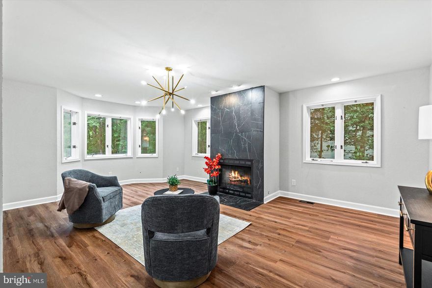 Welcome to 370 Land Or Drive—A Fully Remodeled Lakefront Masterpiece! Step into over 4,300 sq ft of contemporary comfort and refined elegance in this fully renovated custom home. Inside, discover a stunning open-concept kitchen with an island, seamlessly flowing into dining and living spaces warmed by fireplaces. The walk-out lower level adds versatility with generous living areas and elegant finishes. Set on nearly half an acre in the gated, amenity-rich Lake Land ’Or community, this home boasts serene lake views and access to top-tier community features—including a pool, clubhouse, fitness center, dog park, and more. A circular driveway provides abundant parking, while interior and exterior renovations (completed in 2025) deliver modern luxury at every turn. With four bedrooms, four and a half baths, elegant design touches, and all the perks of lakefront living, this home is priced at $529,999, offering remarkable value and lifestyle appeal. Come experience it before it’s gone! HVAC 2025, Windows and doors 2025, siding 2024.