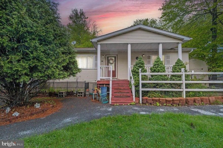 Beautiful Ranch Style home located in a STR Friendly Community. You may have been trying to get away from going upstairs, here goes the perfect home, you would only need to go downstairs to a large family room and another room that can be used for extra Living Space. A laundry room with Washer and Dryer. There are three reasonably sized bedrooms that feature Hard Wood Floors, Expansive Living Room that also features Hard Wood Floors,One bathroom and kitchen with Slider Doors that leads to the Deck that was freshly painted. Front Porch that was added approximately Fifteen years. Paved Driveway on both side of the property. With the right offer Seller will give a credit of 10k for the installation of a New Roof. Hurry and make your appointment as this will not last. HOA Fee is 1,788 Annually. Home Warranty is included.