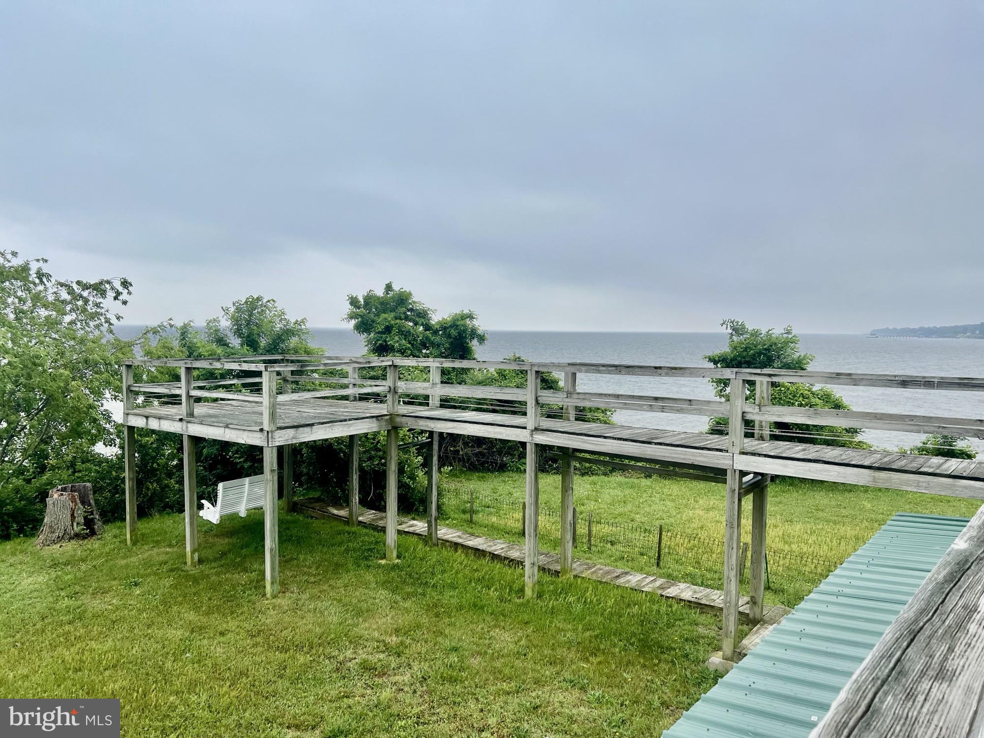 Waterfront rental in beautiful Pinehurst with sweeping views of the Chesapeake Bay! Furnished, three bedrooms and two full baths. Screened porch, fireplace, office space, hardwoods, updated kitchen and more! Waterfront side of home faces east! Fantastic views from the Bay Bridge to North Point. Vacation at home. Large deck and pier. Resident osprey also returns year after year! Landlord interested in a long term lease. Available immediately. New furniture and appliances!