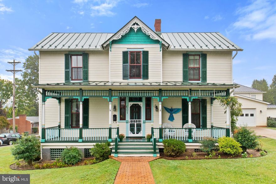 Rare opportunity to become the new owner of this one-of-a-kind, Victorian style home located near the heart of beautiful downtown Culpeper! Attention to detail shines throughout this home beginning from the beautiful brick walkway that leads you to the detailed front porch. Enter the grand center hall foyer to the main level with a lovely, updated kitchen with Corian countertops, large island and white cabinets with ample storage and a walk-in pantry. Bright and airy sunroom off the kitchen leading to a composite deck with retractable awning, spacious separate formal dining room perfect for entertaining, a formal living room and and an additional room that could easily convert into a main level bedroom and attached bath with clawfoot tub and pedestal sink. Upper level offers hardwood floors throughout, a large primary bedroom with french doors leading to a full bathroom and large walk-in closet. 2 additional bedrooms and another full bath with laundry. Situated on a corner lot that is landscaped to perfection with a 3-car garage and driveways off of Blue Ridge Ave or Chandler St. This established, well-built home has been meticulously maintained and updated to preserve its original character and charm. This one will not last long!