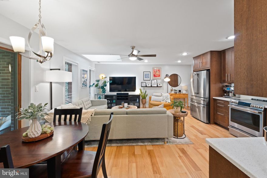 Enjoy the perfect balance of convenience and privacy in this beautifully updated condo. Just minutes from shopping, dining, community activities, Solomons Island and PAX River Naval Air Station, this home is tucked into a quiet community that offers a peaceful setting while keeping you close to everything you need. Step inside to discover thoughtful upgrades throughout, including hand-scraped engineered hardwood floors, recessed lighting, fresh paint, and upgraded trim & doors. A 2-ton Amana HVAC system with smart thermostat for efficiency and comfort that was just recently installed! The kitchen is a showstopper, featuring custom cabinets, GE Café Series appliances, quartz countertops, tile backsplash, under-cabinet lighting, and a designer sink/faucet. A newer skylight and modern ceiling fans brighten the open living space, making it warm and inviting. A dedicated laundry room adds everyday convenience with full-size washer & dryer, cabinetry, a wood folding countertop, and a clothes rod for hanging. The updated bathroom features newer cabinets, sink, faucet, toilet, tiled floor, re-coated cast-iron tub with a new surround and recessed shelf, and a fan with built-in speaker and lighting. Relax outdoors on the private balcony, finished with teak flooring, painted railing and ceiling, and a stylish light fixture—a perfect spot for morning coffee or evening downtime. With every detail carefully updated—including drywall, blinds, outlets, and hardwired smoke detectors,—this condo is truly move-in ready.