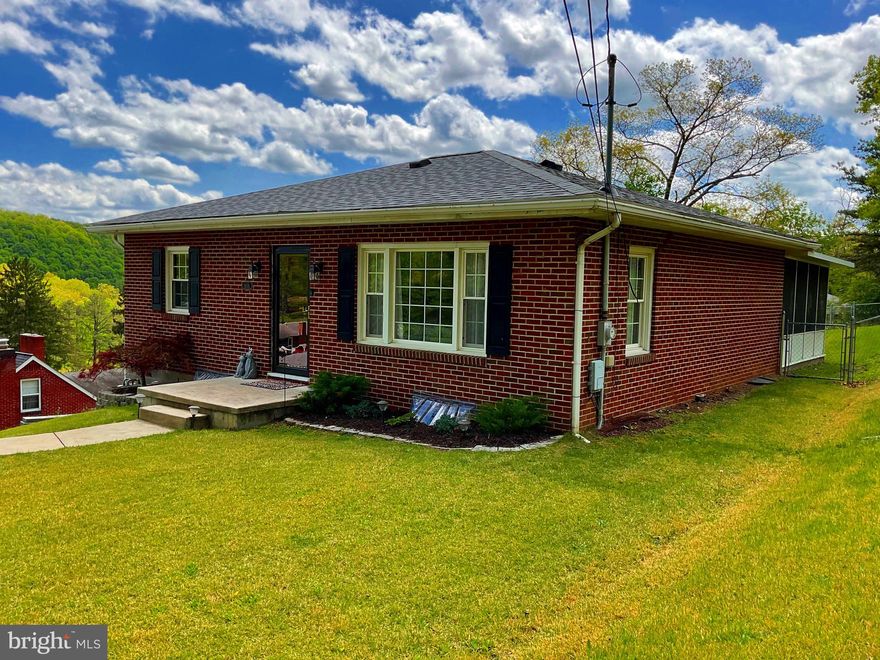 There's no place like home and you have found it!! Welcome to this beautifully maintained 2-bedroom, 1 bath brick ranch home. Nestled in a quiet neighborhood, this home features a solid brick exterior, a brand new roof (October 2024), a one car built in garage and a full basement with laundry and storage. The interior features a spacious and inviting living room with an abundance of natural light, an updated kitchen with ceramic tile floors and stainless-steel appliance and generous sized bedrooms with hardwood floors.  The full bath has also been updated with a new tub and toilet. Step outside to a large fenced in back yard or simply relax in the comfort of the screened in patio perfect for enjoying morning coffee, evening breezes, or entertaining guests without the bugs.  

Whether you are downsizing, buying your first home, or looking for low maintenance living, this move in ready gem checks all the boxes.  Don't miss your chance to own this exceptional home!