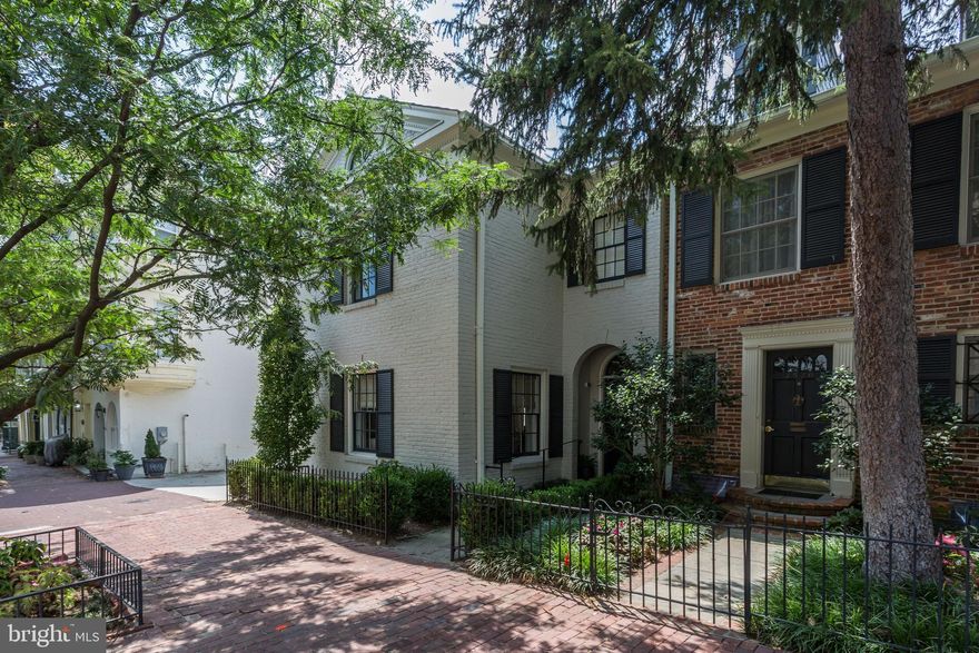 Beautifully renovated from top to bottom in 2017 by builder John Cecchi, this spectacular Georgetown home features the highest quality finishes. 3 CAR PARKING! The main level features a light-filled Formal Living, Dining Room, and large open Kitchen/Family Room. Kitchen featuring marble countertops, state-of-the-art stainless steel appliances including a six-burner stove w/built-in range, microwave, and wine cooler.  Charming Screened in-Porch off Family Room looking out on Garden/Patio.  Beautiful Master Suite, laundry room and 2 spacious bedrooms w/-en-suite Full Baths and ample closet space complete the 2nd level.  The 3rd Level features an additional bedroom and Full Bath.  The Lower Level has a Recreation Room w/ gas fireplace, Bedroom, Full Bath and a 2nd Laundry Room.