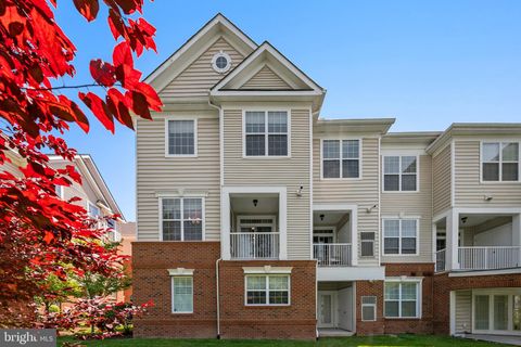 Photo of 23275 Milltown Knoll Square #118, ASHBURN, VA 20148 (MLS # VALO2126578)
