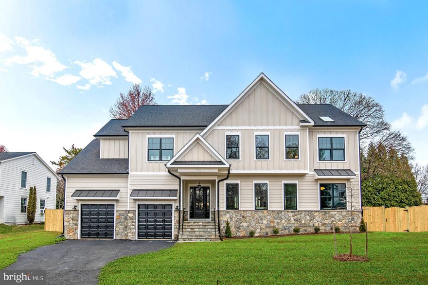 Just Built! Nestled in the heart of McLean, this exquisite home sits on a spacious half-acre lot, offering both privacy and convenience in a prime location. The stunning stone front elevation enhances its timeless curb appeal, while the professionally designed exterior features a blend of Hardie Plank siding, black exterior windows, gutters, and downspouts. A spacious three-car garage with 15 foot ceilings perfect for car lift, complete with keypad entry and remote control, provides ample parking and storage. The beautifully landscaped front yard sets the stage for this remarkable home, while the fenced-in backyard features a covered and screened-in porch, perfect for year-round outdoor living.

Inside, the gourmet kitchen is a chef’s dream, boasting a massive 10-foot island, quartz countertops, luxury appliances, and a top-of-the-line 42-inch gas stove. Soft-close cabinetry with double trash pullouts, under-cabinet lighting, a tile backsplash, a custom-built hood, and elegant Champagne Bronze fixtures complete the sophisticated look. A large walk-in pantry ensures plenty of storage for all your culinary needs.

The open-concept floor plan is designed for both comfort and entertaining, featuring soaring 10-foot ceilings on the first floor and 9-foot ceilings on the second. Hardwood floors, recessed LED lighting, oak stairs, and accent walls with built-in shelving add character and charm. Each second-floor bedroom includes a spacious walk-in closet, while the 1+2 panel shaker interior doors and a stylish three-toned interior package for trim, ceilings, and walls add a refined touch. Elegant chandeliers in the dining room and foyer elevate the home’s luxurious feel.

The primary suite is a true retreat, featuring a spa-like bathroom with quartz countertops, ceramic tile, a walk-in shower, and a soaking tub. Additional full bathrooms throughout the home maintain the same level of high-end finishes.

Entertainment abounds in the fully finished basement, complete with a custom-built bar and a state-of-the-art theater—perfect for hosting movie nights and gatherings. The home is also equipped with energy-efficient HVAC systems and Energy Star appliances, ensuring optimal comfort and cost savings.

With its unbeatable location, expansive lot, high-end finishes, and exceptional amenities, this McLean masterpiece offers the perfect blend of luxury, style, and functionality.