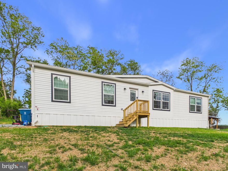 Recently constructed beautiful 3-bedroom, 2-bath modular home sits on a spacious 1.90-acre lot in a peaceful country setting. Never occupied until 2026, the home offers modern comfort and an inviting open layout designed for both everyday living and entertaining.

The stylish kitchen features a center island, stainless steel appliances, and ample cabinet space with a walk in pantry, flowing seamlessly into the large family room. The spacious primary suite includes a walk-in closet and a private bath highlighted by a stunning tiled walk-in shower. Two additional bedrooms, a second full bath, and convenient main-floor laundry complete the interior.

Outside, enjoy your own private retreat with a sauna, gazebo, greenhouse, and storage shed — perfect for relaxing, gardening, and extra storage. With plenty of room to enjoy both indoors and out, this property offers the ideal blend of comfort, privacy, and country living.