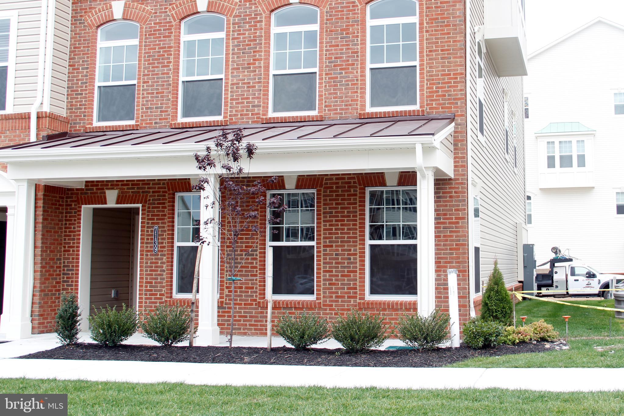 Brand new LUXURY Condo featuring hardwood floors throughout the kitchen, dining and family rooms. 3 bed, 2.5 baths. Attached garage with ample additional parking, in sought after Oxford Square, a transit-oriented, Green Living, the community that's merely a private community shuttle ride away to the Dorsey MARC Station, a short walk to Howard County's newest schools, and under two minutes to major highways to both Baltimore and DC. Designed for healthy living, and privately nestled between green spaces, Oxford Square combines the best of natural surroundings with upscale sports and fitness amenities, like brand new playfields, pool, basketball courts, and gym area.