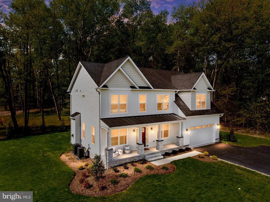 Welcome to 1252 Sunrise Beach Road, a rare Crownsville offering where one extraordinary property delivers two fully independent residences on 2.4 private acres. Newly built by Cedar Square Homes, this estate-style property was designed for the way people truly live today, offering exceptional flexibility for multigenerational living, extended family, private guest accommodations, an au pair suite, home office needs, or potential income-producing possibilities. The main residence is beautifully appointed with refined finishes, open living spaces, a stunning kitchen, generous bedrooms, and the comfort of new construction throughout. The separate private residence creates an entirely different level of opportunity, offering its own living space, kitchen, bedroom, bath, and entrance, allowing family or guests to live comfortably and independently while still being connected to the property. Set back on a peaceful and private 2.4-acre setting, this home offers the rare combination of space, privacy, flexibility, and modern luxury in one of Crownsville’s most desirable locations. This is not a standard new construction home and it is not a typical resale. It is a lifestyle property, a private retreat, and an incredibly hard-to-find solution for buyers who need more than just bedrooms and baths. Minutes from Annapolis, Severna Park, major commuter routes, shopping, dining, and the Chesapeake Bay lifestyle, 1252 Sunrise Beach Road offers a unique opportunity to own a newly built private estate with room for everyone and options that are almost impossible to replicate.