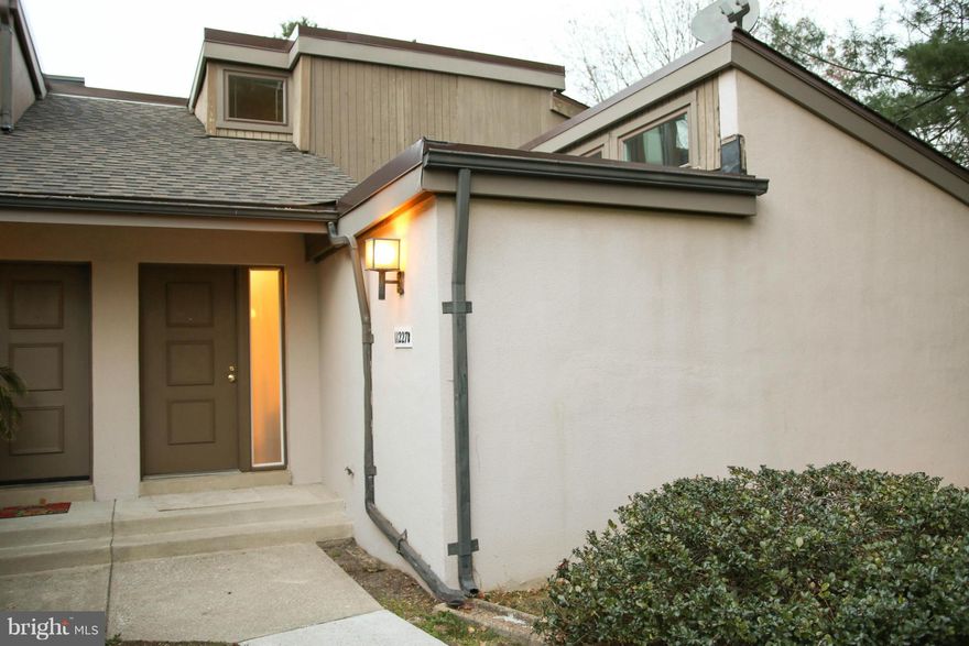 Move right into this charming 3 bed/2 bath TH w/many updates incl new carpet & pergo floors, fresh paint, remodeled kitchen (2013), windows(2013), heat pump (2009); W/D(2010), H2O heater(2009) & roof (2016). Main Level Master Bed w/vaulted ceil & walk-in closet. Dramatic 2-story FR w/cozy fireplace. Fenced rear yard & Carport. Close to Village Centers w/shops & dining. Community is FHA approved!