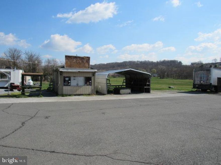 Are you ready to embark on a fresh entrepreneurial journey? Look no further! We're offering an exciting opportunity to lease your stand in a vibrant and high-traffic location.  Stand Features: 12x20.  A carport with shelves already installed for you to display all your produce or wares and a cold storage building. Located on the corner of Bakerton and Rt 340 in a bustling area with ample vehicle traffic.