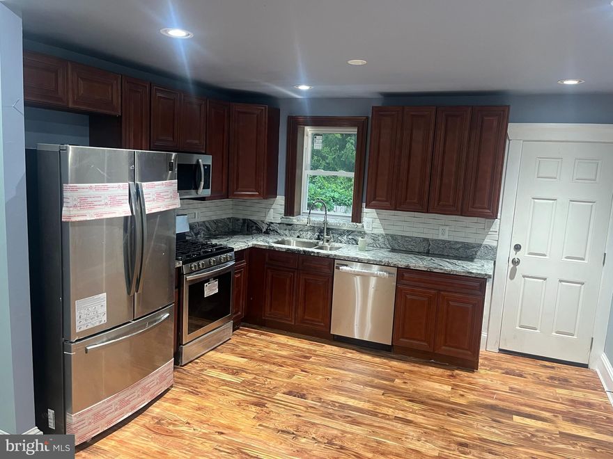 This move in ready home is located in a  prime real estate area of the Harlem Park neighborhood.  1720 Harlem Ave is a fully renovated 5 bedroom 2 bath  home located within minutes of the major highway and beltway for easy commuting into Washington DC and other surrounding locations.   This  home is surrounded by greenery with an open area directly across the street and playground, with an open field, providing plenty of green space for outdoor activities, located directly behind the home.  This  property has been fully renovated, with brand new  plumbing and electrical, as well as other finishes that makes this home very desirable.  This home will not last long so submit your offer today!