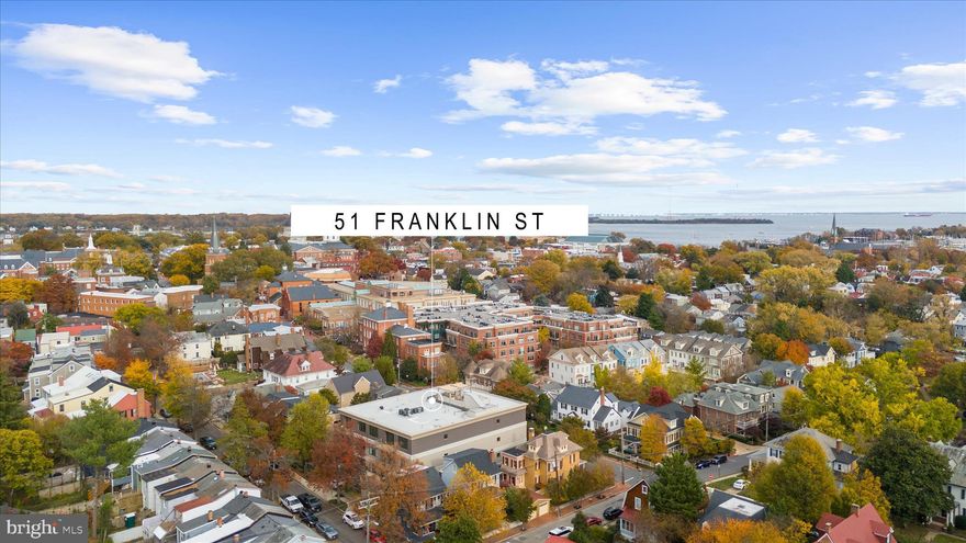 An exclusive and rare opportunity could be yours!  Welcome to 51 Franklin, consisting of 9 high-end boutique units, developed by John Pilli & constructed by Gate One custom builders in 2020. Located at the intersection of Murray Hill and the city's Historic District, this exquisite condo provides high-end finishes including Legno-Bastone wide-plank hardwood flooring, Caesarstone waterfall counters, Omega cabinetry, Thermador & Wolf appliances, and beautiful designer plumbing and lighting fixtures. California Closets in all bedrooms, pantry and coat closet. Airy ten foot ceilings. Amenities include elevator, rooftop terrace w/luxurious views, secured covered garage parking with 2 assigned spots per unit, extra storage unit 3 steps from condo entry,  gas cooking and water usage. Easy walking to Main St, the West St Arts District, and all points Downtown Annapolis...a true lock and leave experience for the next fortunate Owner! SEE VIDEO 'TOURS' FOR IN DEPTH INFO ABOUT THIS SMALL, EXTRAORDINARY HIGH END CONDO BUILDING DESIGNED BY THE ARCHITECTS OF  FOURTH STREET DESIGN,  AND BUILT BY JOHN PILLI AND GATE ONE BUILDERS