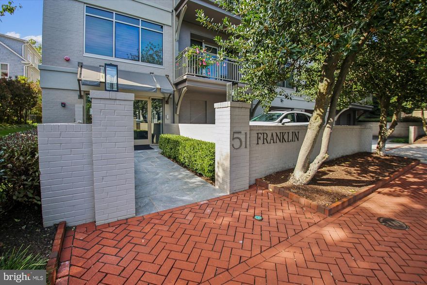 An exclusive and rare offering has come to market!  Welcome to 51 Franklin, consisting of 9 high-end boutique units, developed by John Pilli & constructed by Gate One custom builders in 2019/2020. Located at the intersection of Murray Hill and the city's Historic District, this exquisite condo provides high-end finishes including Legno-Bastone wide-plank hardwood flooring, Caesarstone counter-tops, Omega cabinetry, Thermador/Wolf appliances & beautiful designer selected plumbing and lighting fixtures. California Closets in all bedrooms, pantry and coat closet. Lofty ten foot tall ceilings. Amenities include main elevator, rooftop terrace w/luxurious views, secured covered garage parking with 2 assigned spots per unit, extra storage unit 3 steps from condo entry,  gas cooking and water usage. Easy walking to Main St, the West St Arts District, and all points Downtown Annapolis...a true lock and leave experience for the next fortunate Buyer! SEE VIDEO 'TOURS' FOR IN DEPTH INFO ABOUT THIS SMALL, EXTRAORDINARY HIGH END CONDO BUILDING DESIGNED BY THE ARCHITECTS OF  FOURTH STREET DESIGN,  AND BUILT BY JOHN PILLI AND GATE ONE BUILDERS