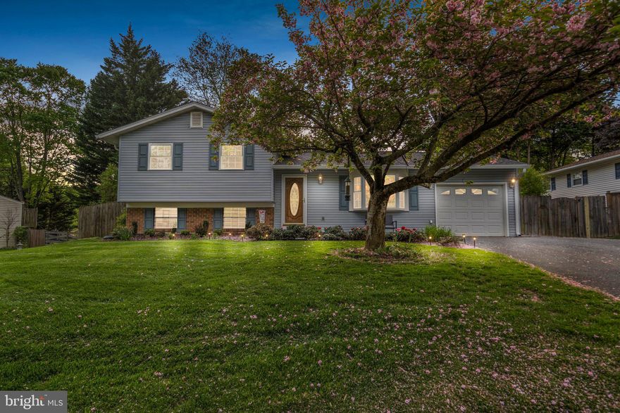 This beautiful home boasts a fantastic flat yard with stunning hardscaping, including both front and back patios, perfect for outdoor entertaining. The upgraded solid wood front door with decorative glass sets the tone as you enter the home with stunning upgraded features such as immaculate laminate floors and chair rail moldings through the entryway and dining room. The kitchen features a tiled backsplash, bay window, and an eat-in area, creating a comfortable and inviting atmosphere. The laminate flooring throughout the home gives a modern feel and is complemented by fresh paint in the bedrooms and bathrooms. The upgraded primary bathroom showcases floor-to-ceiling gray-toned tiling in the shower with a glass door, adding a touch of luxury to your morning routine. The stunning three seasons room offers a peaceful retreat where you can enjoy the beautiful scenery and watch the changing seasons. Step outside onto the large back patio and take in the view of the flat, fenced-in backyard with beautiful landscaping, providing privacy and tranquility. Conveniently located to parks and trails, this home offers the perfect blend of comfort and outdoor recreation. With a one-car attached garage, you'll have plenty of space for your vehicle and storage. This immaculate split-level home is truly a must-see. Open House Sunday, April 30 from 2-4!!