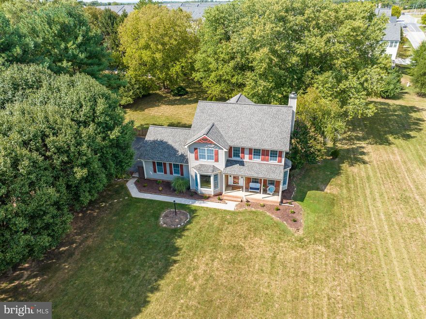 Welcome to 491 Pleasant Valley Drive in Charles Town, WV! This charming single-family colonial home is now available for sale and is the perfect place to call your own. This 4 bedroom, 2 full, and 2 half bath home offers plenty of space for everyone.  Situated on just over  1 acre corner lot, this home boasts a picturesque park-like backyard adorned with mature trees, creating a tranquil oasis. The fenced-in rear yard ensures privacy and provides a safe space for children and pets to play freely. Additionally, a two-car side garage and an expansive driveway offer ample parking space for you and your guests.  The brand new roof ensures peace of mind when it comes to maintenance. Located in a desirable neighborhood, this property is perfect for those seeking a peaceful suburban lifestyle while still being close to all the amenities you need. Conveniently located for commuters, this home provides great access to Maryland and Virginia via Route 340 and Route 9. Whether you work or need to travel to neighboring states, you'll have a seamless daily commute. Don't miss the opportunity to make this beautiful home at 491 Pleasant Valley Drive your own. Schedule a viewing now and discover the perfect blend of comfort, convenience, and tranquility.