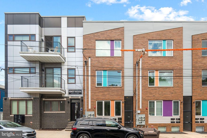 Gorgeous 2-bedroom, 1-bathroom, first-floor condo available for sale in South Kensington, offering excellent curb appeal! This property is just 3 years old and boasts an open floor plan filled with natural light. The eat-in kitchen features granite countertops, stainless steel appliances, ample cabinet space, gas cooking & heating, central air, and hardwood flooring throughout. The two bedrooms are generously sized. This rear first-floor unit also includes a private outdoor patio with city views—ideal for outdoor entertaining and relaxation. Washer, dryer, and refrigerator are included. The multi-unit condo complex offers a security gate for access, security cameras, and the condo itself is equipped with an alarm system for doors and windows, along with motion sensors. Conveniently located within walking distance of Fishtown, Temple University, Northern Liberties, and the SEPTA Market-Frankford El (Berks Station). Plus, there are 5 years remaining on a full tax abatement.