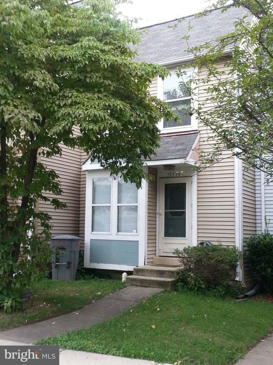 Short Sale Approved!! Pending release. Perfect for a home starter! Don't miss this 2BR, 3.5BA townhouse in Rippon Landing!!!!.   Main lvl with FP and nice deck with great view, Master BR with full BA, walkout BSMT with a den and a full BA.  New water heater, fenced back yard. Needs minor cosmetic work.  This is a short sale and is subject to third party approval.  Short sale specialist!!