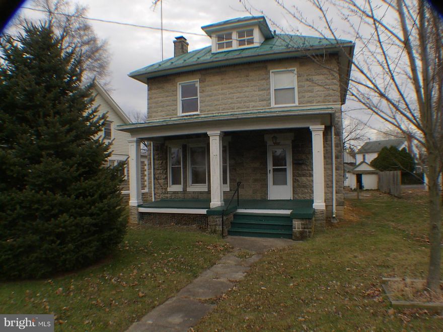Extensive renovation done here.  Refinished hardwood floors, recent new central air, thermal windows and complete painted inside. Metal roof now recoated after several people's concerns.  Parking lot entered from rear alley will park several cars.  Basement unfinished but painted and mighty fine looking.