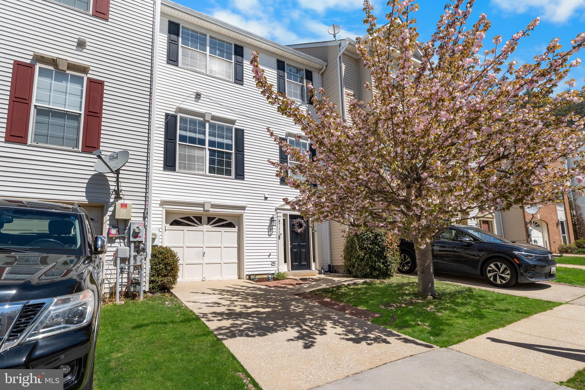Located in the highly acclaimed Piney Orchard Community, this 3 bedroom townhome has a bathroom on every level, 2 living spaces, and a 1-car garage. Over 2,300 square feet welcomes you as you enter the home on the entry level. This level has a good-sized rec room, a powder room, indoor access to your garage, as well as a sliding door exiting onto your fully fenced backyard with paver patio. Head on up to the main level where you will find another powder room, a very spacious living room and formal dining combo, as well as a large eat-in kitchen. The kitchen is fully equipped with an island, gas cooktop with downdraft, double wall ovens, granite countertops, pantry, and access to an oversized deck, perfect for grilling, entertaining, or simply enjoying your morning coffee. On to the bedroom level where you will find your primary suite, 2 additional bedrooms, as well as a hall bath, and bedroom-level laundry. The primary bedroom greets you with lovely double doors, vaulted ceilings, a walk-in closet, and an ensuite bath with a corner soaking tub, separate shower, and double vanity. Additional features include LVP flooring, lots of natural light, a NEW Carrier high-efficiency HVAC, and a prime location within the community with no thru street. The community also has SO much to offer including 3 outdoor pools, 1 indoor year-round lap pool with spa and fitness center, community center, tennis courts, tot lots, an ice rink, a shopping center, walking distance to the elementary school, GORC athletic park, many trails, and the nature preserve is just a hop and a skip from the residence. Additionally, enjoy a seasonal weekly farmer's market at the community center, and food truck nights at the local fire station just a couple miles away! And just for a cherry on top, a 2 year home warranty is transferable to the new owner! Just minutes to Fort Meade, Waugh Chapel, Arundel Mills, and centrally located between Annapolis, DC, and Baltimore.