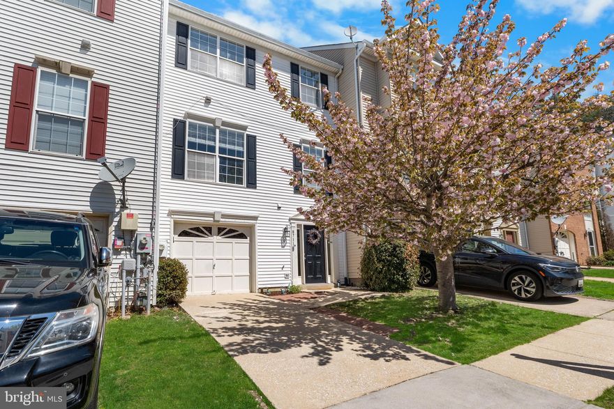 Located in the highly acclaimed Piney Orchard Community, this 3 bedroom townhome has a bathroom on every level, 2 living spaces, and a 1-car garage.  Over 2,300 square feet welcomes you as you enter the home on the entry level.  This level has a good-sized rec room, a powder room, indoor access to your garage, as well as a sliding door exiting onto your fully fenced backyard with paver patio.  Head on up to the main level where you will find another powder room, a very spacious living room and formal dining combo, as well as a large eat-in kitchen.  The kitchen is fully equipped with an island, gas cooktop with downdraft, double wall ovens, granite countertops, pantry, and access to an oversized deck, perfect for grilling, entertaining, or simply enjoying your morning coffee.  On to the bedroom level where you will find your primary suite, 2 additional bedrooms, as well as a hall bath, and bedroom-level laundry.  The primary bedroom greets you with lovely double doors, vaulted ceilings, a walk-in closet, and an ensuite bath with a corner soaking tub, separate shower, and double vanity.  Additional features include LVP flooring, lots of natural light, a NEW Carrier high-efficiency HVAC, and a prime location within the community with no thru street.  The community also has SO much to offer including 3 outdoor pools, 1 indoor year-round lap pool with spa and fitness center, community center, tennis courts, tot lots, an ice rink, a shopping center, walking distance to the elementary school, GORC athletic park, many trails, and the nature preserve is just a hop and a skip from the residence.  Additionally, enjoy a seasonal weekly farmer's market at the community center, and food truck nights at the local fire station just a couple miles away!  And just for a cherry on top, a 2 year home warranty is transferable to the new owner!  Just minutes to Fort Meade, Waugh Chapel, Arundel Mills, and centrally located between Annapolis, DC, and Baltimore.