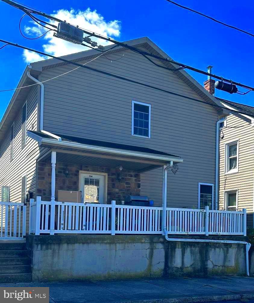 Excellent Investment Opportunity! This duplex features two mirror-image units, each offering a spacious and functional layout. The first floor boasts an open-concept living area, an eat-in kitchen, a convenient half bath, and ample storage with a pantry and multiple closets. Upstairs, each unit includes two bedrooms, both with en-suite full bathrooms and a generous walk-in closet. Laundry area finishes off the upstairs. The front unit enjoys a roomy front porch, while the rear unit features a large private patio. Off-street parking is available behind the property. Both units are currently occupied by long-term tenants on month-to-month leases, who are interested in staying. Ideally located just one block from Main Street in Ephrata, it's within walking distance to downtown shops, dining, and amenities.