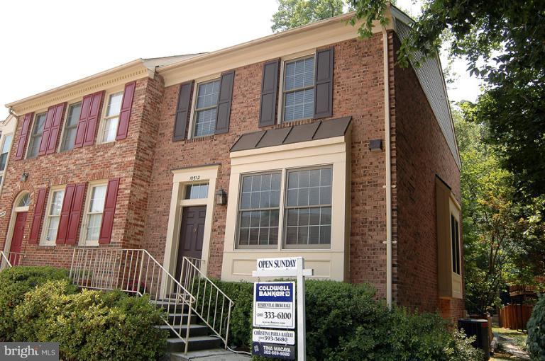 Fabulous townhouse mins to the metro. Enjoy the open and spacious rooms. Large renovated kit, separate dining room over looks the living room with fire place, wet bar, palladium windows & french door opens to an enclosed landscaped & flag stone patio. Powder room laundry room and an additional bedroom. Upper level has two master bedroom suites. Enjoy all this plus the convenient location.