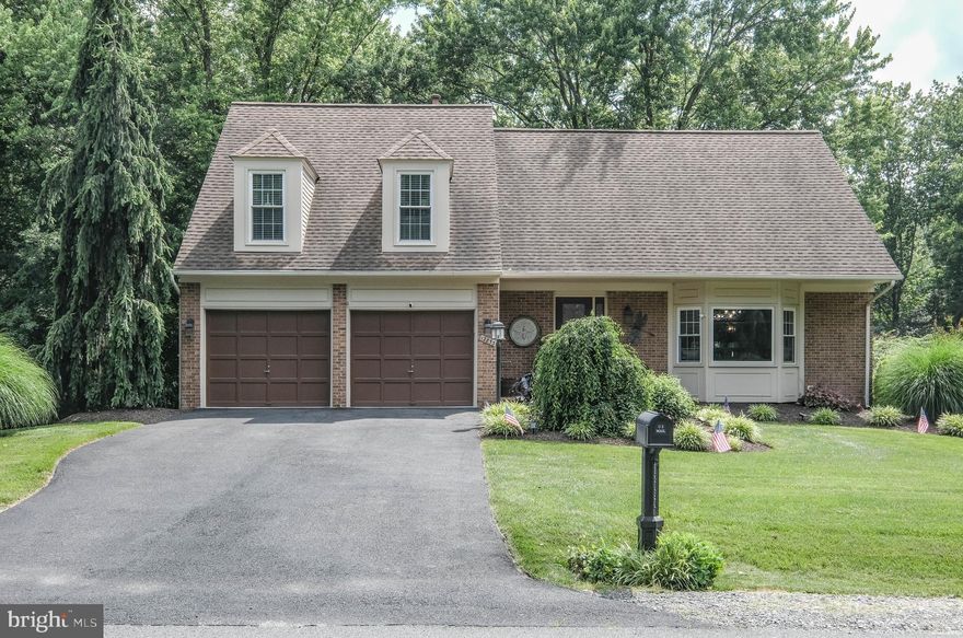 There aren’t enough lovely adjectives to describe this magazine worthy five bedroom 3,000+ finished sf home with more than $100k in updates since 2022! Photos don’t do justice to this delightful property that’s unforgettable both inside and out. A fantastic multi-level layout with upgraded picture windows and updates from top to bottom have transformed it into a contemporary showplace.  It even offers an opportunity for an in-law suite or office in the level walk-out lower level. These original owners have thought of everything and have curated an environment for the future owners to have a truly move-in-ready experience.  HIGHLIGHTS: A $40k kitchen update in 2022 includes all new GE & KitchenAid stainless appliances (including double oven and microwave, both with convection settings), leathered granite, under cabinet lighting, tile backsplash, dream soft close & pull out cabinets (with double trash cans, appliance barn/coffee station, deep pot drawers, layered cutlery drawers, pull-out pantry cabinet and sheet pan cabinet), double sink w/ disposal and remarkable cabinet/counter space (plus a bonus 8 ft long counter/prep area).  All bathrooms have been updated since 2022 (with new lighting, cabinets, fixtures and granite in all 4 bathrooms plus a new soaking tub, walk-in shower & snazzy heated bidet in owner’s bathroom).  EXTERIOR FEATURES:  33x10 foot Trex rear deck (including an 18x10 vaulted covered deck w/ skylights and ceiling fan), steps leading to a lower paver patio under deck, newer garden shed, $5k sprinkler system (in front and rear yards), wooden fenced back yard, gutter helmet (on rear gutters), leaf filter (on front gutters), newer roof (replaced in 2016), replacement windows/siding/exterior doors throughout, solar lights, lighting under upper and lower deck/patio roofs, enhanced landscaping w/ flower beds on all sides of home, new mailbox in 2024, front electronic door lock, brick front siding and matching walkway (with lamp post).  BONUS FEATURES: Skylight in owner’s bathroom and on rear deck, conveying AHS Home Warranty, oversized 2-car garage w/ openers (22x21 with storage areas in rear and grab bars to enter home), basement storage area/workshop (362 sq feet w/ shelving), all hardwood & tile flooring (other than in bedrooms), nearly $5k worth of designer and upgraded light fixtures since 2022 (including 6 new dimmable ceiling fans this year), newer hot water heater, newly updated fireplace area in family room (brick w/ mantle and gas logs), crown molding in all rooms (other than vaulted great room/two-story foyer), oversized laundry room with utility sink, a 10 foot bay window (with custom cushion and window box with top-opening storage doors), dimmable recessed lighting, french doors, granite wet bar between breakfast nook and family room, picture/double windows (along rear of entire main and lower levels), 2 bidet toilet attachments, open hardwood staircase/upper hall (with 2 linen closets) overlooking great room, primary bedroom w/ two closets (one is a walk-in), 4 rooms with cedar closet enhancements, updated door hardware & switch plates.  ABOUT THE AREA: Lake Ridge offers 1,200 acres of maintained common grounds and amenities from water access (for powered and non-powered boats as well as fishing) to 5 swimming pools (including waterslides, spa, sauna and a splash pad).  The community offers so much for active residents. Enjoy a golf course, 7 pickleball courts, 12 basketball courts, 6 tennis courts, a beach volleyball court, 19 playgrounds, 2 fitness station clusters, miles of county trails, 2 community centers, a baseball diamond, soccer field, and MORE! Enjoy a plethora of nearby shopping, wineries, golf courses and more. See documents section for distance from home to nearby transportation, cities, attractions and more. This property is less than 5 miles from Amtrak, VRE, commuter lot, I-95, Rt 1, Potomac Mills, Occoquan river access, and shopping galore! SEE THE VIRTUAL TOUR ICON!