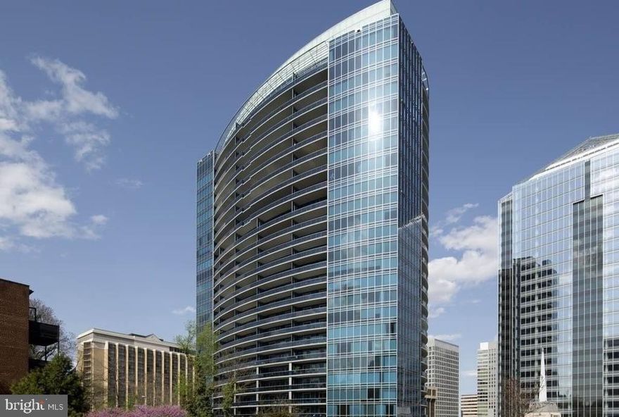 Open House 5/25/24. Best Priced Condo at TURNBERRY TOWER one of the  finest in luxury condo living. 1404 sqft with a beautiful view of the city 1 bedroom, a den with pocket doors (can be used as a second bedroom) 2 exquisite full bathrooms,  Top of the line finishes include Miele and Subzero kitchen appliances, Italian Snaidero cabinets in the kitchen and bathrooms and Dornbracht hardware. Dramatic floor to ceiling windows and doors open to the huge balcony that spans the width of the condo with views of Georgetown and Rosslyn. The primary bathroom has marble floors and walls, jetted tub and rain shower heads. Full size Miele washer/dryer in the unit. The building lobby has a 24-hour concierge front desk and professional security. A porte cochere entrance offers 24-hour valet services for you and your guests. There's a state of the art fitness center with private studios, classes, spa and personal trainer services; glass-enclosed heated swimming pool, hot tub and sun terrace; social room with catering kitchen; private theater room; dry cleaning service; carwash in the garage. IDEAL LOCATION 2 blocks from the Rosslyn Metro Station, easy access to DC, Georgetown, Reagan National Airport and Rt 66.